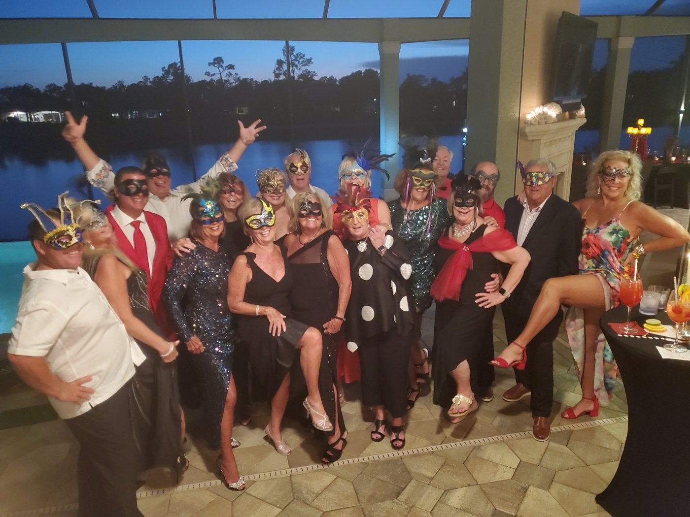Group of guests in masks at a private event